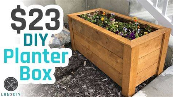 What do you put on the bottom of a planter box?
