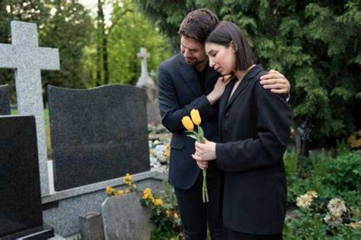Where does an ex wife sit at a funeral?