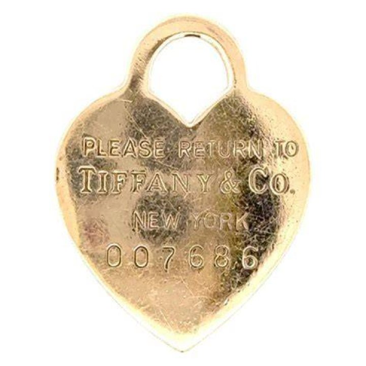 Why does Tiffany jewelry say please return?